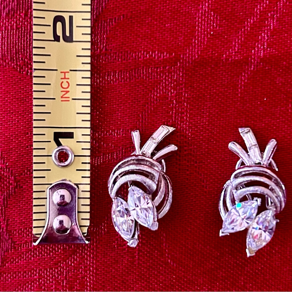 Vintage circa 1970’s omega style clip Earrings clear rhinestones and silvertone